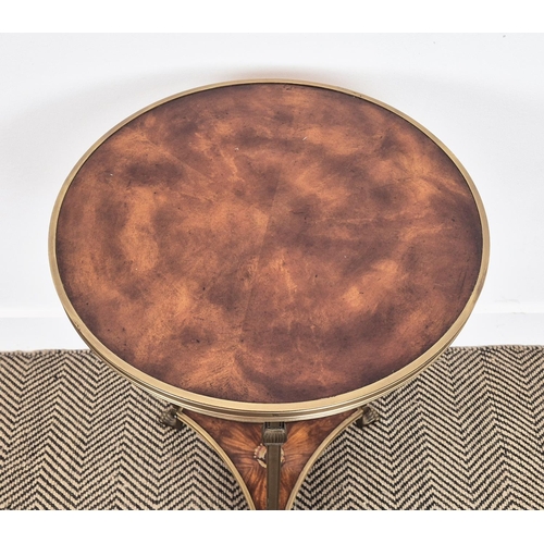 220 - SIDE TABLE, the circular top on brass support, with heraldic crest to undertier, 46cm W x 71cm H.