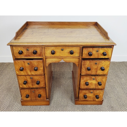 226 - KNEEHOLE DESK, early Victorian birch with a ¾ gallery above nine drawers with ebonised handles, 92cm... 