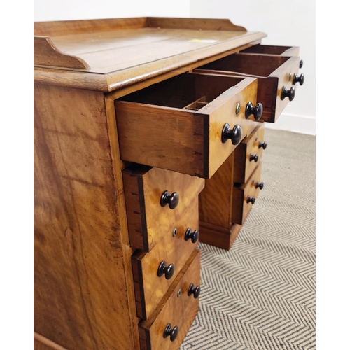 226 - KNEEHOLE DESK, early Victorian birch with a ¾ gallery above nine drawers with ebonised handles, 92cm... 