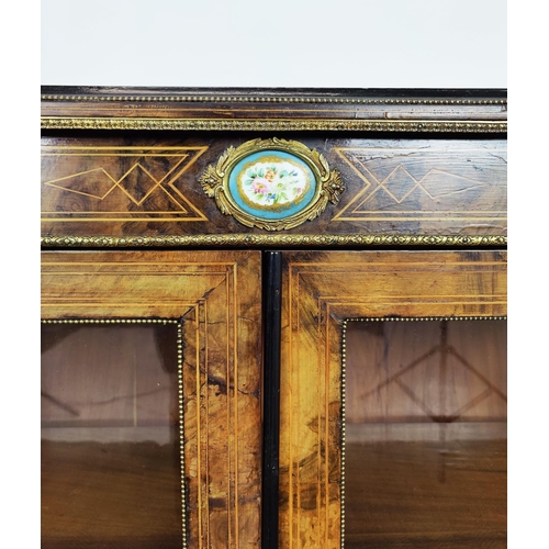 229 - VICTORIAN WALNUT DISPLAY CABINET, with gilt detail, decorative columns and porcelain plaque detail, ... 