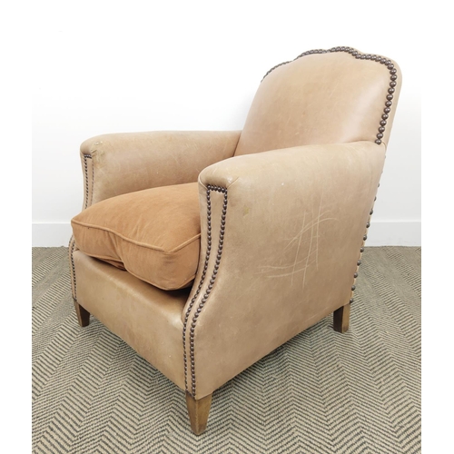 242 - CLUB ARMCHAIR, early 20th century in pale tan leather with velvet seat cushion, 81cm H x 84cm W x 72... 