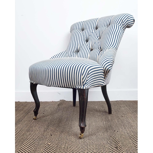 252 - SLIPPER CHAIR, Napoleon III ebonised with new ticking upholstery and brass front castors, 83cm H x 6... 