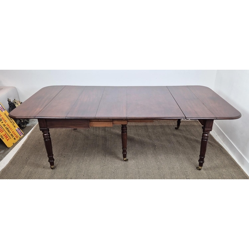 256 - DINING TABLE, William IV mahogany with drop flap top and three extra leaves on brass castors, 73cm H... 