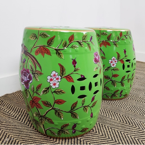 313 - BARREL STOOLS, a pair, green ceramic with floral and bird decoration, 48cm H x 33cm. (2)