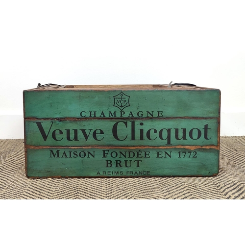 325 - WOODEN BOXES, a set of four, with champagne label decoration largest 26cm H x 55cm x 40cm D. (4)