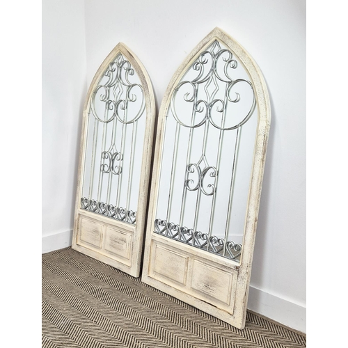 327 - ARCHITECTURAL WALL MIRRORS, a pair, with white arched frames, 140cm H x 67cm. (2)