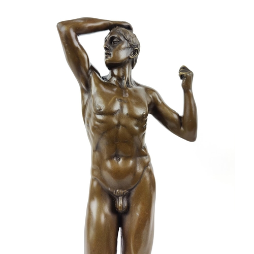 329 - CONTEMPORARY SCHOOL SCULPTURE, of a nude male figure in bronze, 46cm H.