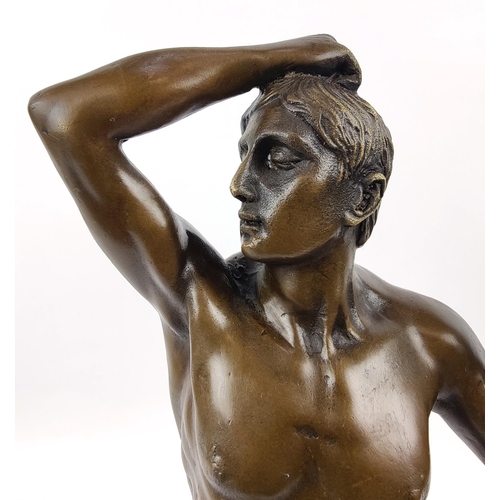 329 - CONTEMPORARY SCHOOL SCULPTURE, of a nude male figure in bronze, 46cm H.