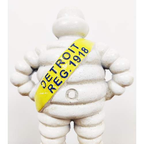 348 - MICHELIN MAN SCULPTURE, painted cast metal, 40cm H.