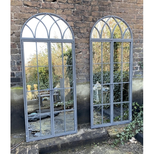 456 - ARCHITECTURAL GARDEN MIRRORS, a set of three, gated arched metal frames, 180cm H x 75cm. (3)