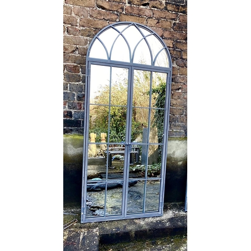 456 - ARCHITECTURAL GARDEN MIRRORS, a set of three, gated arched metal frames, 180cm H x 75cm. (3)