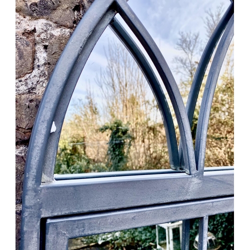 456 - ARCHITECTURAL GARDEN MIRRORS, a set of three, gated arched metal frames, 180cm H x 75cm. (3)