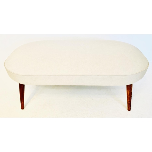 478 - FOOTSTOOL, 1950s Italian style, with neutral linen upholstery on tapered wooden supports,  43cm x 10... 