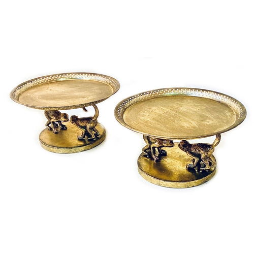 495 - TAZZAS, a pair, monkey supports, gilt finish, 20cm H x 35cm x 35cm. (2)