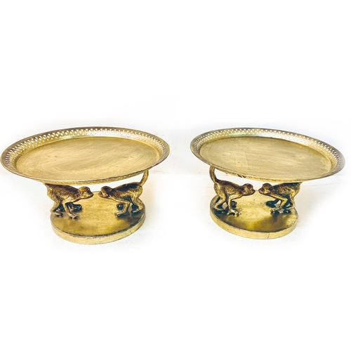 495 - TAZZAS, a pair, monkey supports, gilt finish, 20cm H x 35cm x 35cm. (2)