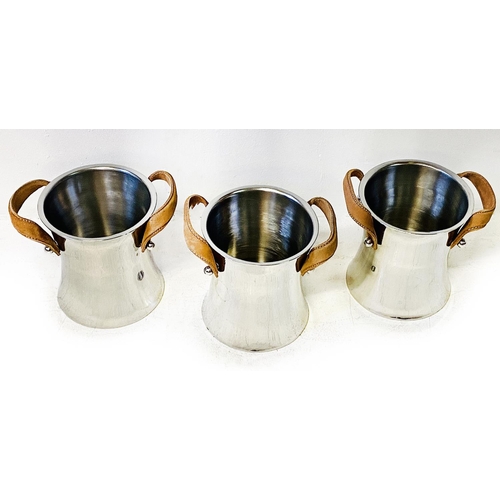 496 - WINE COOLERS, a set of three, contemporary concave design polished metal with leathered handles, 23c... 