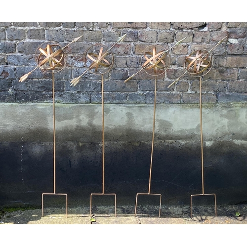 499 - ARMILLARY SHPERE GARDEN STAKES, a set of four, copper coloured metal, 115cm H x 40cm x 17cm. (4)