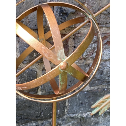 499 - ARMILLARY SHPERE GARDEN STAKES, a set of four, copper coloured metal, 115cm H x 40cm x 17cm. (4)