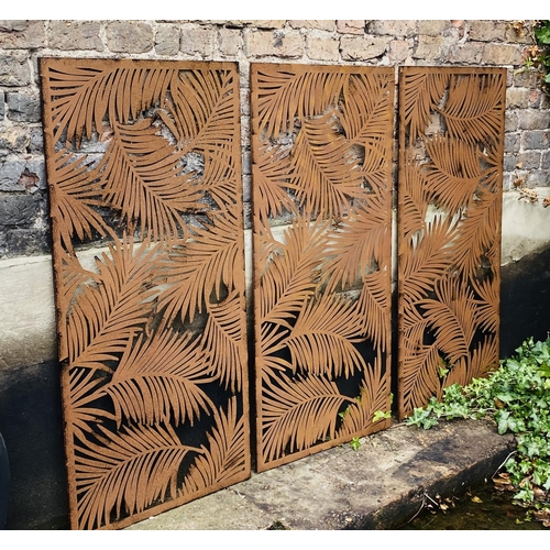 501 - ARCHITECTURAL GARDEN PANELS, a set of three, metal with palm leaf design, each panel 120cm H x 60cm.... 