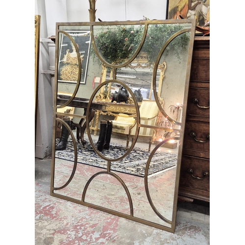 506 - JULIAN CHICHESTER WALL MIRROR, shaped brass frame, 115cm H x 87cm W.