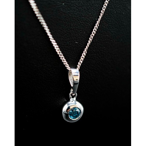 29 - 14CT WHITE GOLD BLUE DIAMOND PENDANT, with silver chain, boxed, RBC diamond 0.20ct.