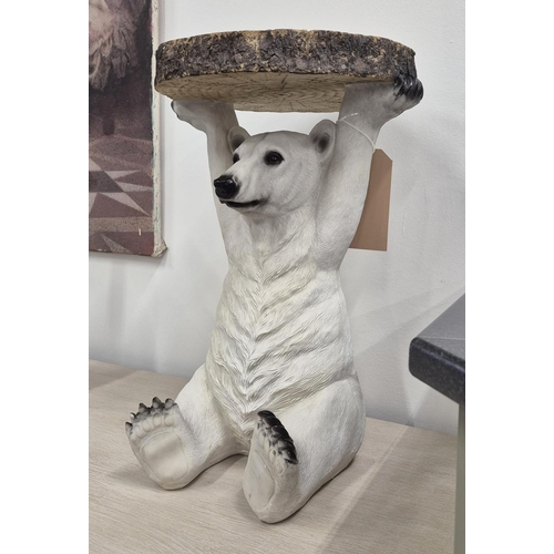 373 - SIDE TABLE, in the form of a polar bear, polychrome resin, 52cm H x 34cm diam approx.