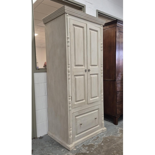 513 - WARDROBE, grey painted, two doors above deep pull out drawer to base, 89cm x 62cm x 196cm.