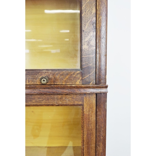 199 - STACKING BOOKCASE, five tier, early 20th century oak, with glazed doors, by ' Ideal, F. Soennecken',... 