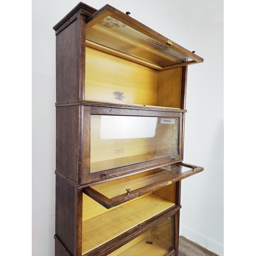 199 - STACKING BOOKCASE, five tier, early 20th century oak, with glazed doors, by ' Ideal, F. Soennecken',... 