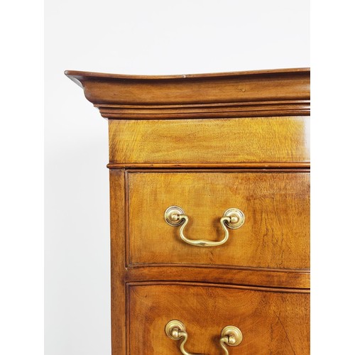 173 - SERPENTINE TALLBOY, early 20th century George III style mahogany of six drawers in one piece, 140cm ... 