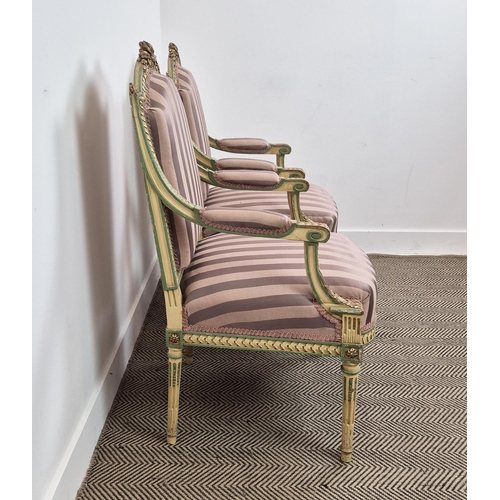 176 - FAUTEUILS, a pair, late 19th century French parcel gilt, cream and green painted with mauve striped ... 