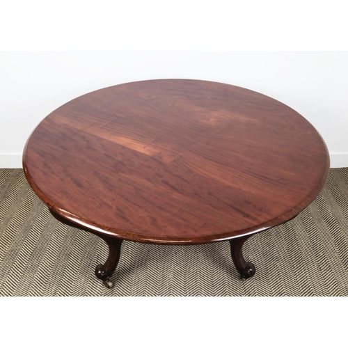 191 - CENTRE TABLE, Victorian mahogany with circular top on brass castors, 76cm H x 129cm D.