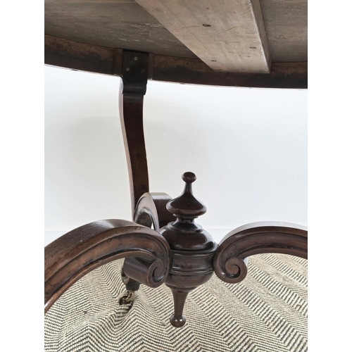 191 - CENTRE TABLE, Victorian mahogany with circular top on brass castors, 76cm H x 129cm D.