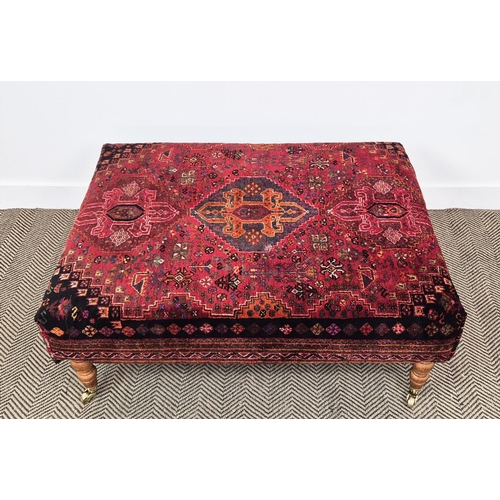 193 - HEARTH STOOL, rectangular red carpet upholstered on beech legs and brass castors, 43cm H x 105cm W x... 