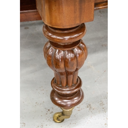 194 - DINING TABLE, Victorian mahogany with three extra leaves on six lobed baluster legs and brass castor... 