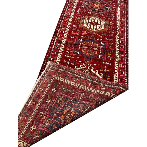 105 - PERSIAN KARAJA RUNNER, 485cm x 90cm.