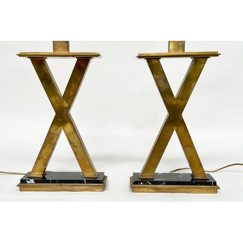 300 - TABLE LAMPS, a pair, Art Deco influence X frame gilt metal on white striated black marble bases, 56c... 