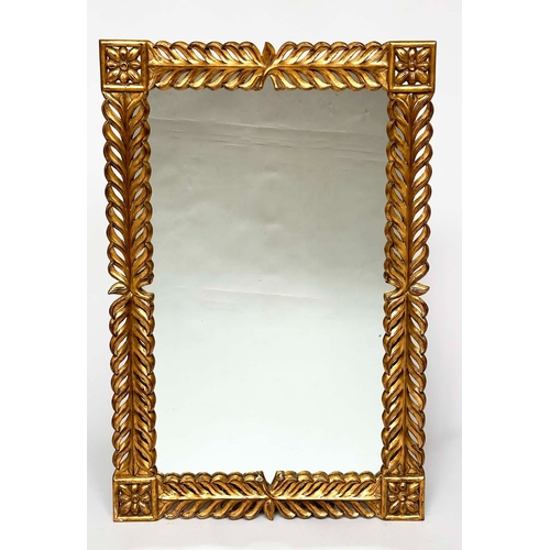 258 - HARRISON AND GIL WALL MIRROR, rectangular giltwood with foliate symmetrical frame with rosette corne... 