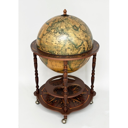 264 - GLOBE COCKTAIL CABINET, in the form of an antique terrestrial globe with rising lid and fitted inter... 