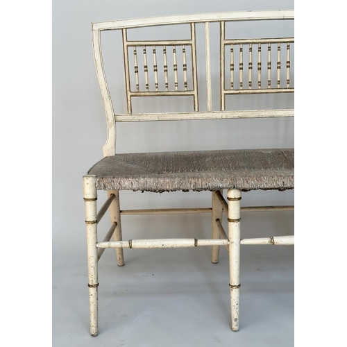 221 - HALL BENCH, 19th century painted with arched spindle rail back and rush seat, 87cm H x 117cm W.