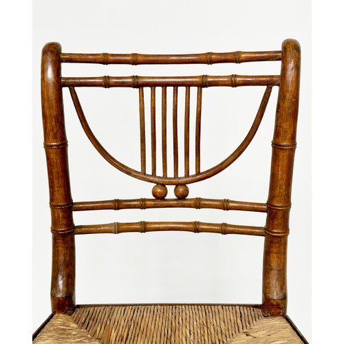 204 - SIDE CHAIRS, a pair, Regency faux bamboo each with lyre backs, woven rush seats and swept supports, ... 