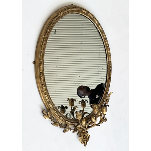 206 - GIRANDOLE, 19th century giltwood and gesso moulded, oval beaded frame with three branch foliate cand... 