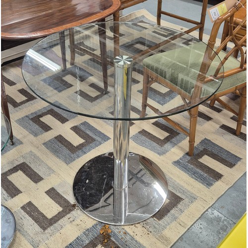 536 - DINING TABLE, polished metal, glass top, 80cm diam x 75cm.