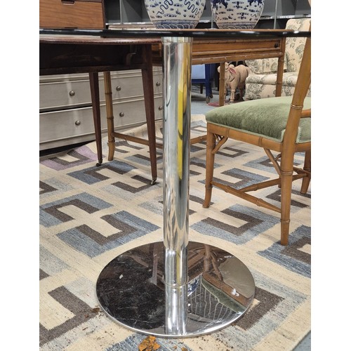 536 - DINING TABLE, polished metal, glass top, 80cm diam x 75cm.