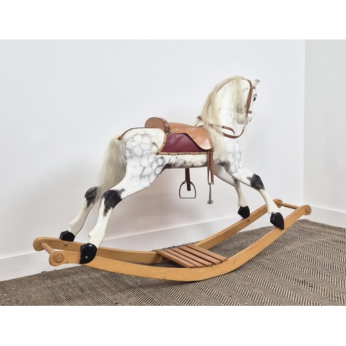 228 - A VICTORIAN STYLE DAPPLED ROCKING HORSE, leather embellishments, horsehair tail and mane, 105cm H x ... 