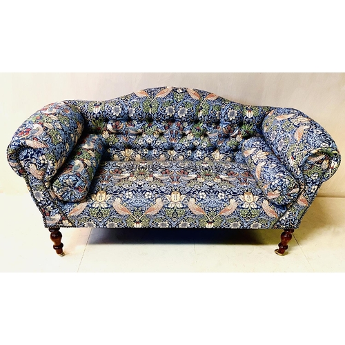 406 - SOFA, William Morris style upholstery with bolster cushions on turned wooden supports, 78cm H x 136c... 