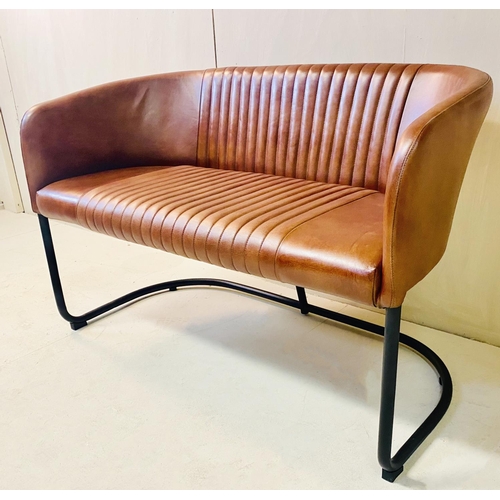 408 - SOFA, vintage style, tan leather upholstery on tubular frame, 76cm H x 90cm W x 34cm D.