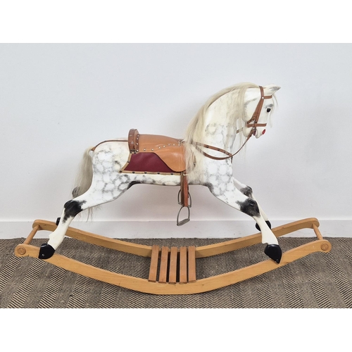 228 - A VICTORIAN STYLE DAPPLED ROCKING HORSE, leather embellishments, horsehair tail and mane, 105cm H x ... 