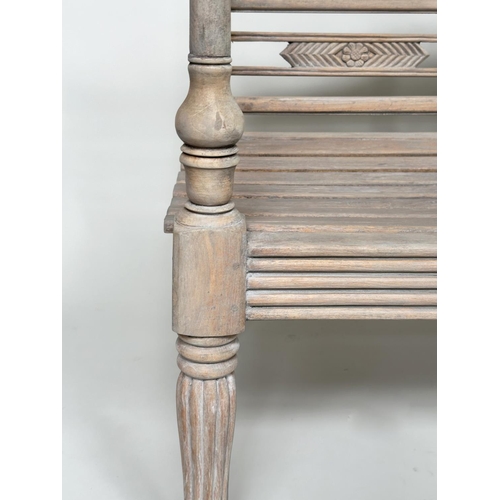 493 - GARDEN BENCH, vintage colonial style faded teak, 133cm W.