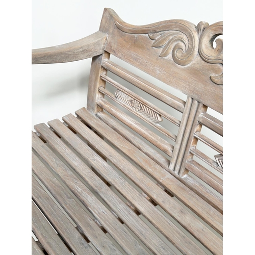 493 - GARDEN BENCH, vintage colonial style faded teak, 133cm W.